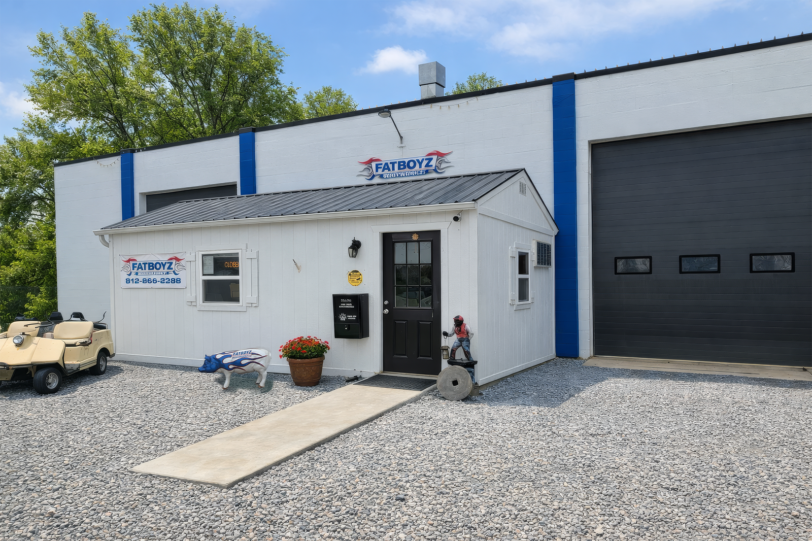 Auto shop exterior at dusk